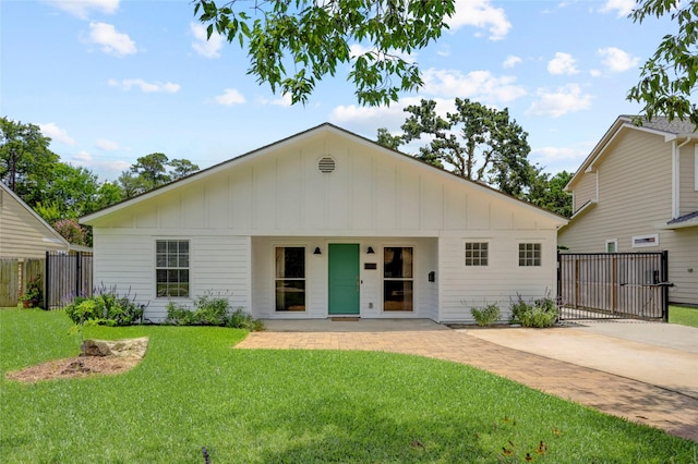 1039 Lamonte Ln, Houston, TX 77018 - view of front of home featuring board and batten siding, a patio, and driveway