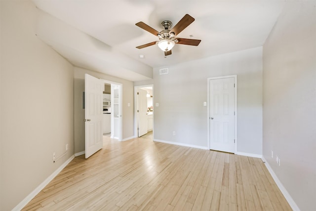 1330 Old Spanish Trl Unit 1210, Houston, TX 77054 - unfurnished room with a ceiling fan and light wood-style floors