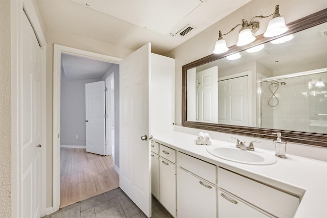 1330 Old Spanish Trl Unit 1210, Houston, TX 77054 - bathroom with vanity, a stall shower, and tile patterned floors