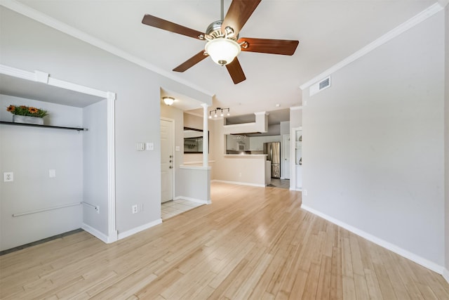 1330 Old Spanish Trl Unit 1210, Houston, TX 77054 - unfurnished living room with a ceiling fan, light wood finished floors, and ornamental molding