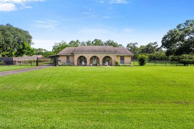 2306 Westfield St, Alvin, TX 77511 - single story home featuring driveway and a carport