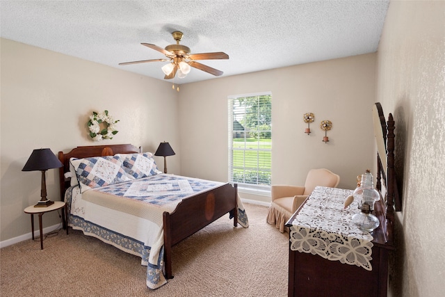 2306 Westfield St, Alvin, TX 77511 - bedroom featuring light colored carpet, a ceiling fan, and a textured ceiling