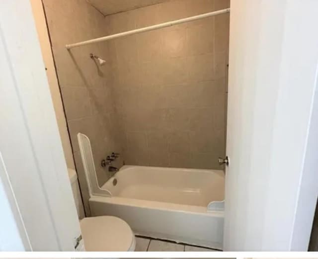 10555 Turtlewood Ct Unit 2303, Houston, TX 77072 - bathroom featuring shower / washtub combination and tile patterned flooring