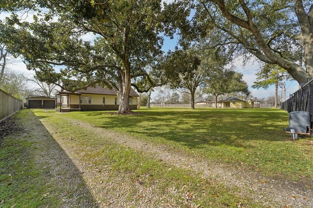 5302 Pine Ave, Pasadena, TX 77503 - view of yard with driveway