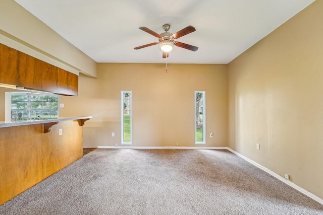 5302 Pine Ave, Pasadena, TX 77503 - unfurnished living room featuring ceiling fan and carpet floors