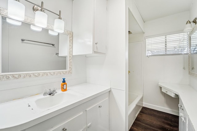 5302 Pine Ave, Pasadena, TX 77503 - full bathroom featuring vanity, wood finished floors, and tub / shower combination