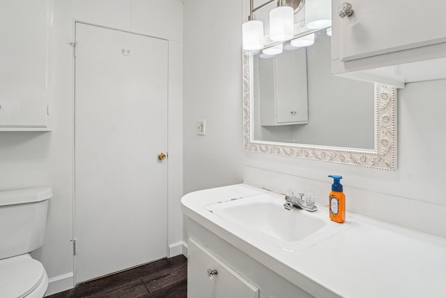 5302 Pine Ave, Pasadena, TX 77503 - bathroom featuring vanity and wood finished floors