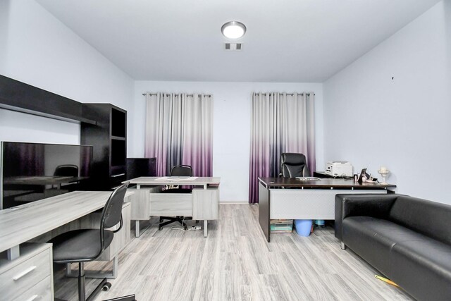 14710 Branchwest Dr, Houston, TX 77082 - home office featuring light wood-type flooring