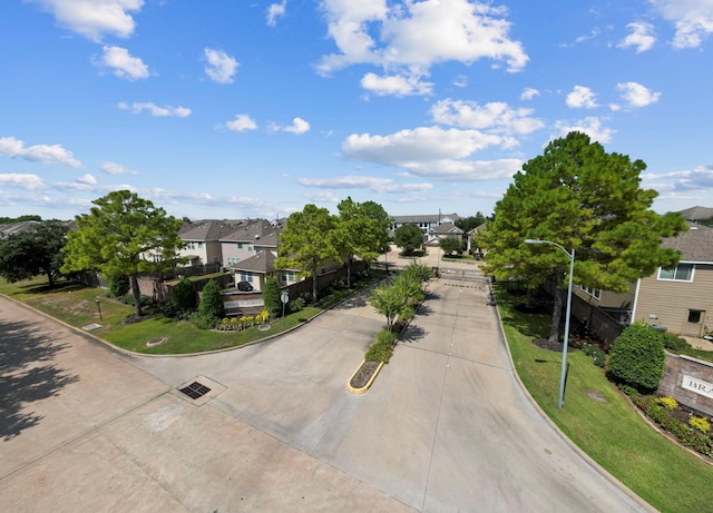 14710 Branchwest Dr, Houston, TX 77082 - view of front of house featuring concrete driveway and a residential view