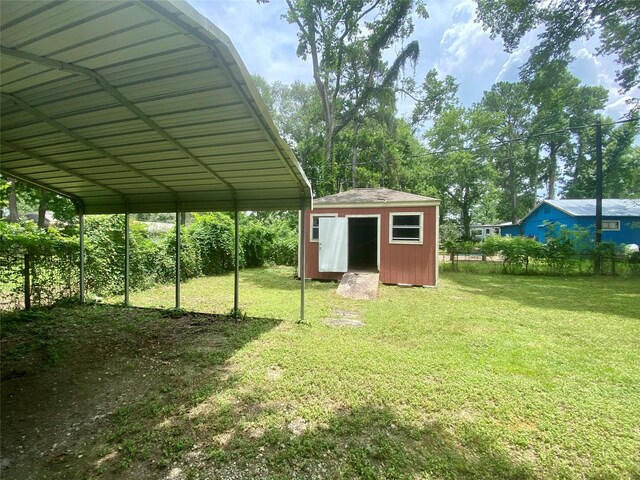212 Harding Ave, Cleveland, TX 77327 - view of yard featuring a shed