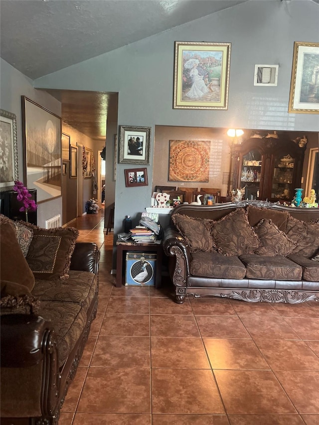 11733 Knotty Pine Trl, Houston, TX 77050 - living area featuring lofted ceiling and tile patterned flooring