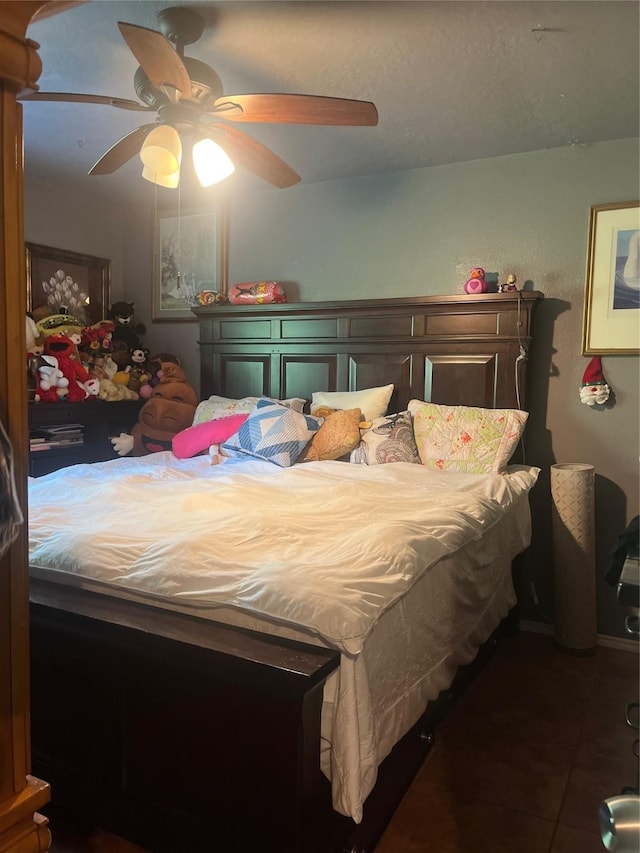 11733 Knotty Pine Trl, Houston, TX 77050 - bedroom with ceiling fan and tile patterned floors