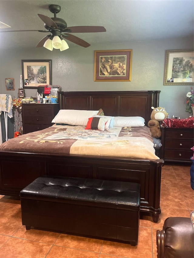 11733 Knotty Pine Trl, Houston, TX 77050 - bedroom featuring light tile patterned flooring and a ceiling fan