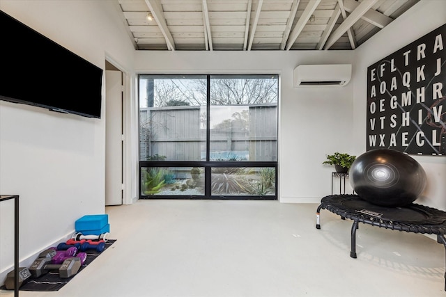 9718 Checkerboard St, Houston, TX 77096 - workout area with a wall unit AC, vaulted ceiling, and wooden ceiling