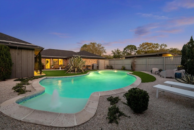 9718 Checkerboard St, Houston, TX 77096 - pool at dusk featuring a patio and a fenced backyard