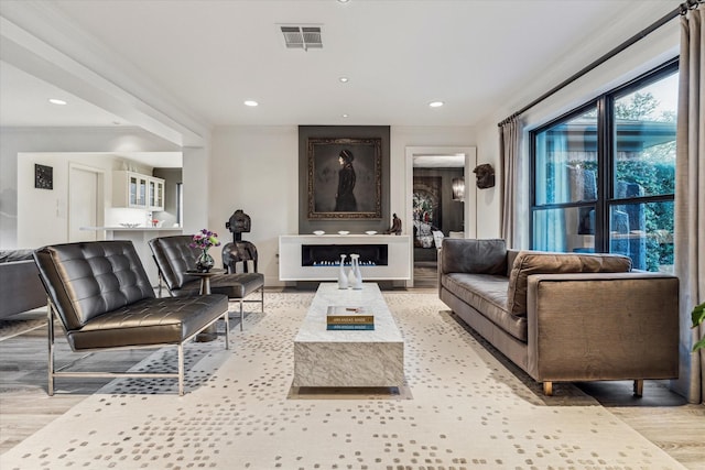 9718 Checkerboard St, Houston, TX 77096 - living area featuring light wood-style flooring and recessed lighting