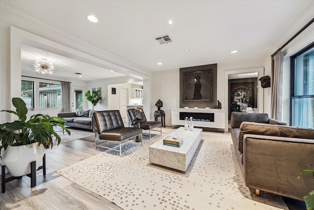 9718 Checkerboard St, Houston, TX 77096 - living area featuring plenty of natural light, light wood-type flooring, and recessed lighting