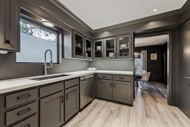 9718 Checkerboard St, Houston, TX 77096 - kitchen with dishwasher, gray cabinetry, light wood-style floors, light countertops, and glass insert cabinets