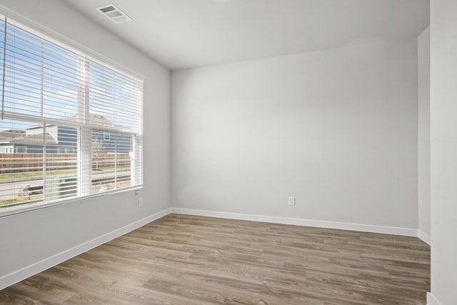 316 Amy St, Angleton, TX 77515 - spare room with wood finished floors and baseboards