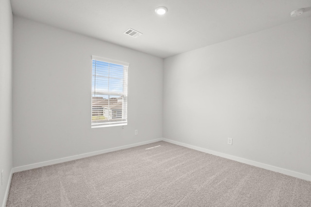 316 Amy St, Angleton, TX 77515 - carpeted spare room featuring a smoke detector and baseboards