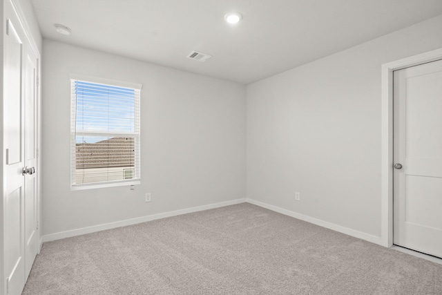 316 Amy St, Angleton, TX 77515 - carpeted spare room featuring a smoke detector and recessed lighting