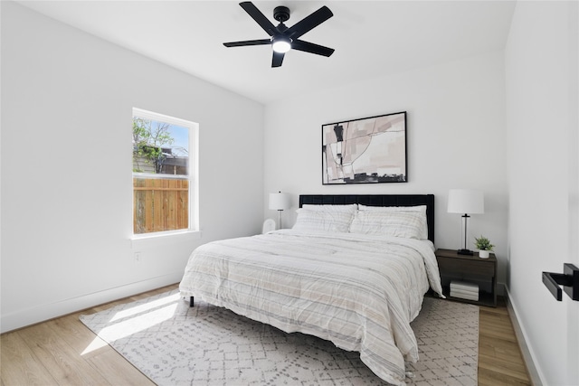 6907 Conley St, Houston, TX 77021 - bedroom with wood finished floors and ceiling fan