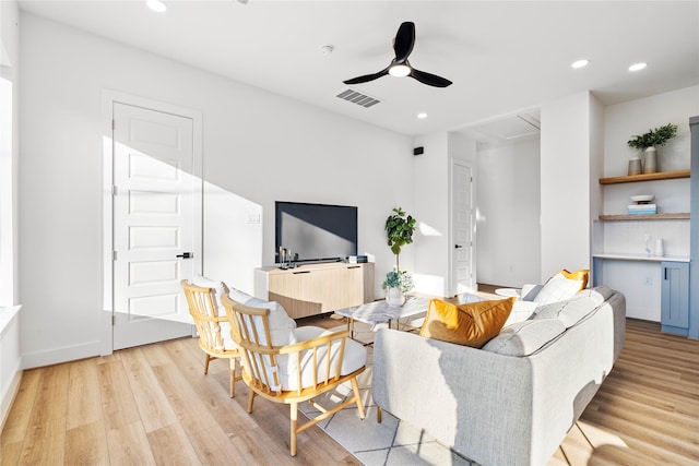6907 Conley St, Houston, TX 77021 - living area with light wood-type flooring, recessed lighting, and a ceiling fan
