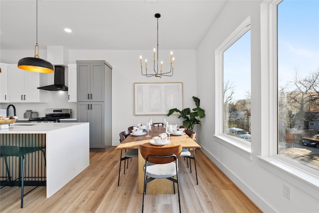 6907 Conley St, Houston, TX 77021 - dining space featuring a chandelier, light wood-style floors, plenty of natural light, and recessed lighting