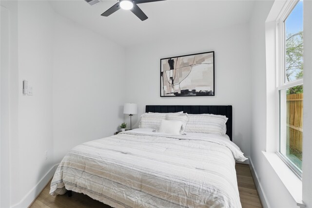 6907 Conley St, Houston, TX 77021 - bedroom with wood finished floors and a ceiling fan