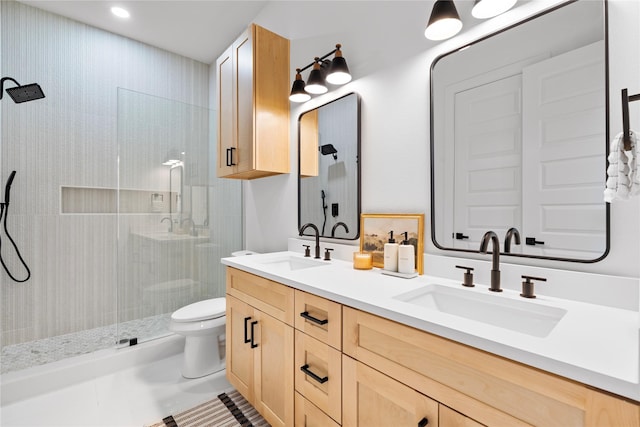 6907 Conley St, Houston, TX 77021 - bathroom featuring a stall shower, double vanity, and recessed lighting