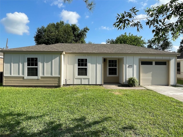 8766 Flossie Mae St, Houston, TX 77029 - ranch-style house with a garage, driveway, board and batten siding, and a front yard