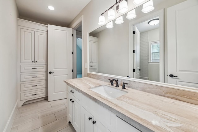 1901 Woodcrest Dr, Houston, TX 77018 - bathroom with vanity and baseboards