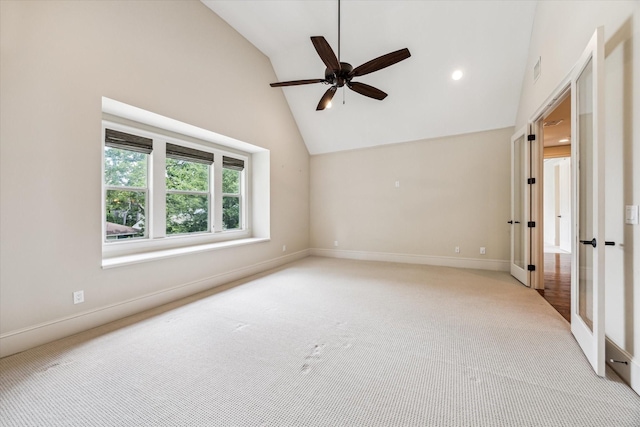 1901 Woodcrest Dr, Houston, TX 77018 - unfurnished room with light colored carpet, a ceiling fan, high vaulted ceiling, and recessed lighting