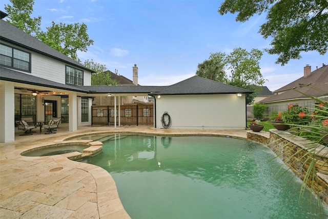 15431 Greens Cove Way, Houston, TX 77059 - view of swimming pool with a patio, a fenced backyard, and a pool with connected hot tub