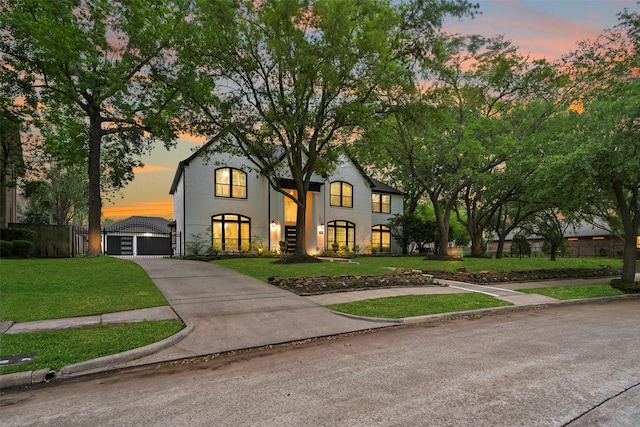 15431 Greens Cove Way, Houston, TX 77059 - view of front of house featuring a gate, stucco siding, and driveway