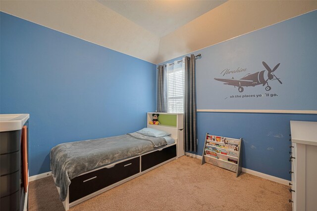 8113 E Pine Creek Bnd, Cypress, TX 77433 - bedroom featuring carpet flooring and lofted ceiling