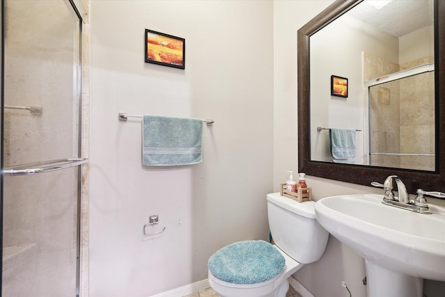 1018 Memorial Village Dr Unit 124, Houston, TX 77024 - bathroom with toilet and a shower stall