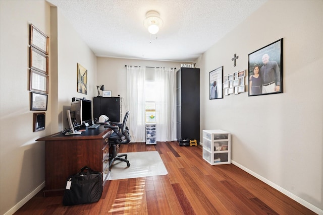 1018 Memorial Village Dr Unit 124, Houston, TX 77024 - office area with wood finished floors and a textured ceiling