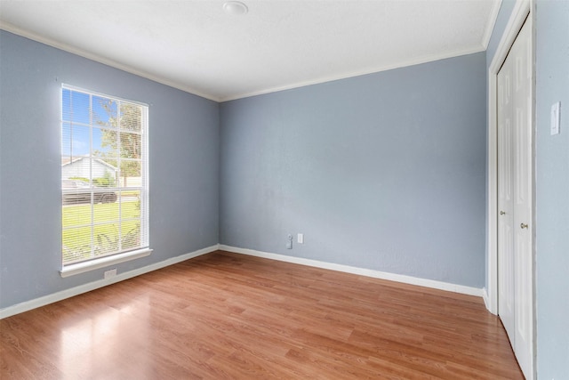 1418 Louisiana Ave, Pasadena, TX 77536 - empty room with ornamental molding and light wood-style floors