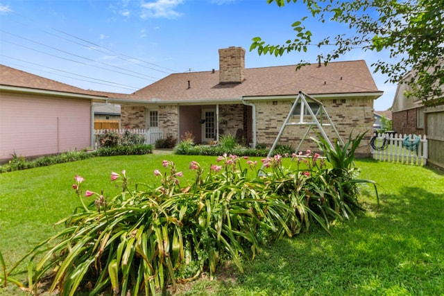 1418 Louisiana Ave, Pasadena, TX 77536 - rear view of property with a chimney and brick siding