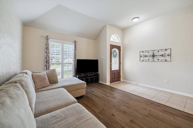 9111 Kinnel Ln, Tomball, TX 77375 - living area featuring lofted ceiling and wood finished floors