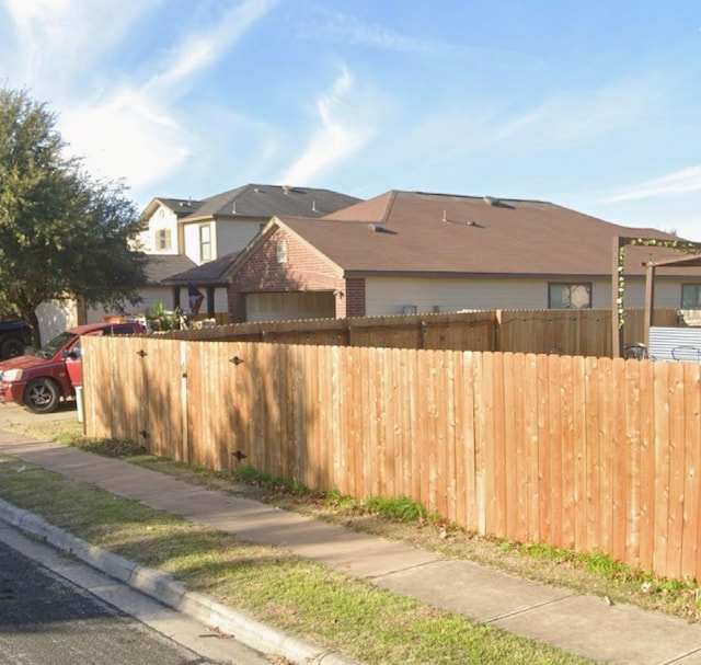5608 Nijmegen Dr, Del Valle, TX 78617 - view of street featuring curbs and sidewalks