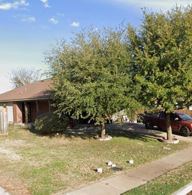 5608 Nijmegen Dr, Del Valle, TX 78617 - view of front of property featuring a front yard