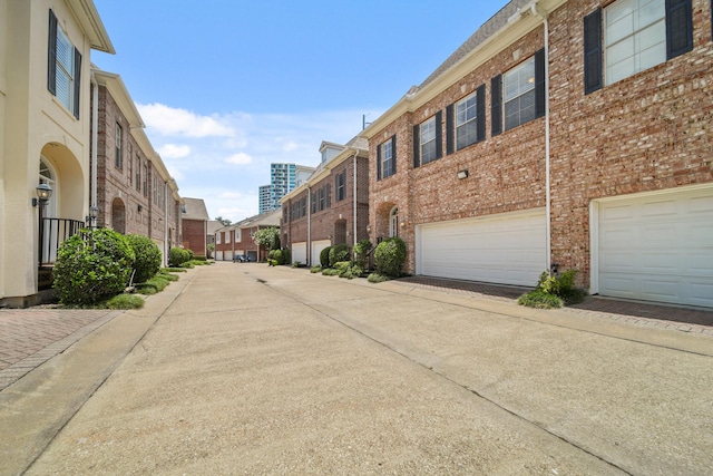 1931 Woodbury St, Houston, TX 77030 - view of concrete road with a residential view