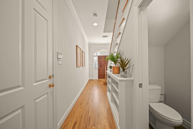 1931 Woodbury St, Houston, TX 77030 - hall featuring light wood-type flooring, recessed lighting, and crown molding