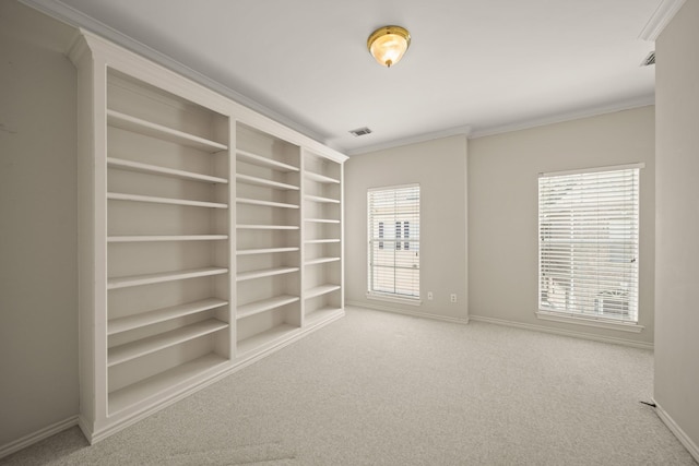 1931 Woodbury St, Houston, TX 77030 - carpeted empty room featuring baseboards and crown molding