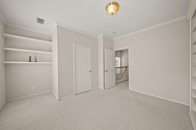 1931 Woodbury St, Houston, TX 77030 - unfurnished bedroom featuring crown molding and carpet