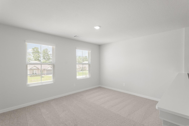 436 Shoreview Dr, Conroe, TX 77303 - spare room featuring light carpet