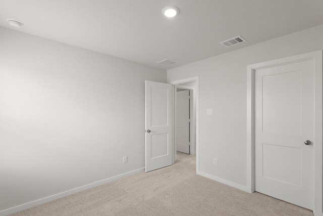 436 Shoreview Dr, Conroe, TX 77303 - unfurnished bedroom featuring light carpet and baseboards