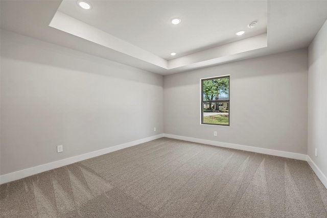 2845 14th St, Hempstead, TX 77445 - unfurnished room with a raised ceiling, recessed lighting, carpet floors, and a smoke detector